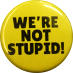 A badge with the text "We're not stupid!"