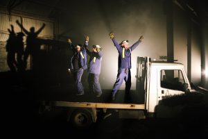 A photograph of We're Still Here, a site-responsive, political promenade theatre piece about the Welsh Steel Industry.