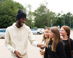 grime artist speaking to participants