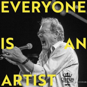 The words "Everyone Is An Artist" are laid on top of a black and white image of a white man singing really loudly into a microphone