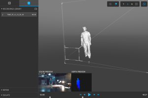 A screen shot showing a person in a studio - their figure as a digital animation in a virtual space