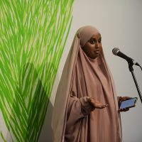 Poet reading at Grenfell: We Stand With You Event.