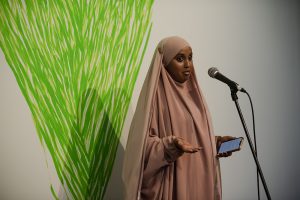 Poet reading at Grenfell: We Stand With You Event.