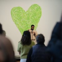 Poet reading at Grenfell: We Stand With You Event.