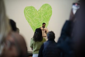 Poet reading at Grenfell: We Stand With You Event.