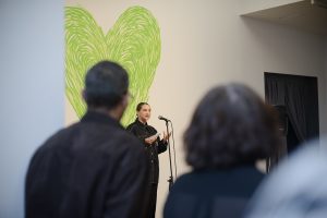 Poet reading at Grenfell: We Stand With You Event.