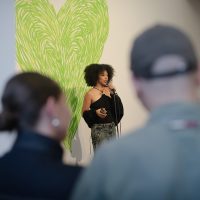 Poet reading at Grenfell: We Stand With You Event.