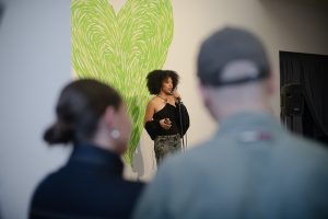 Poet reading at Grenfell: We Stand With You Event.