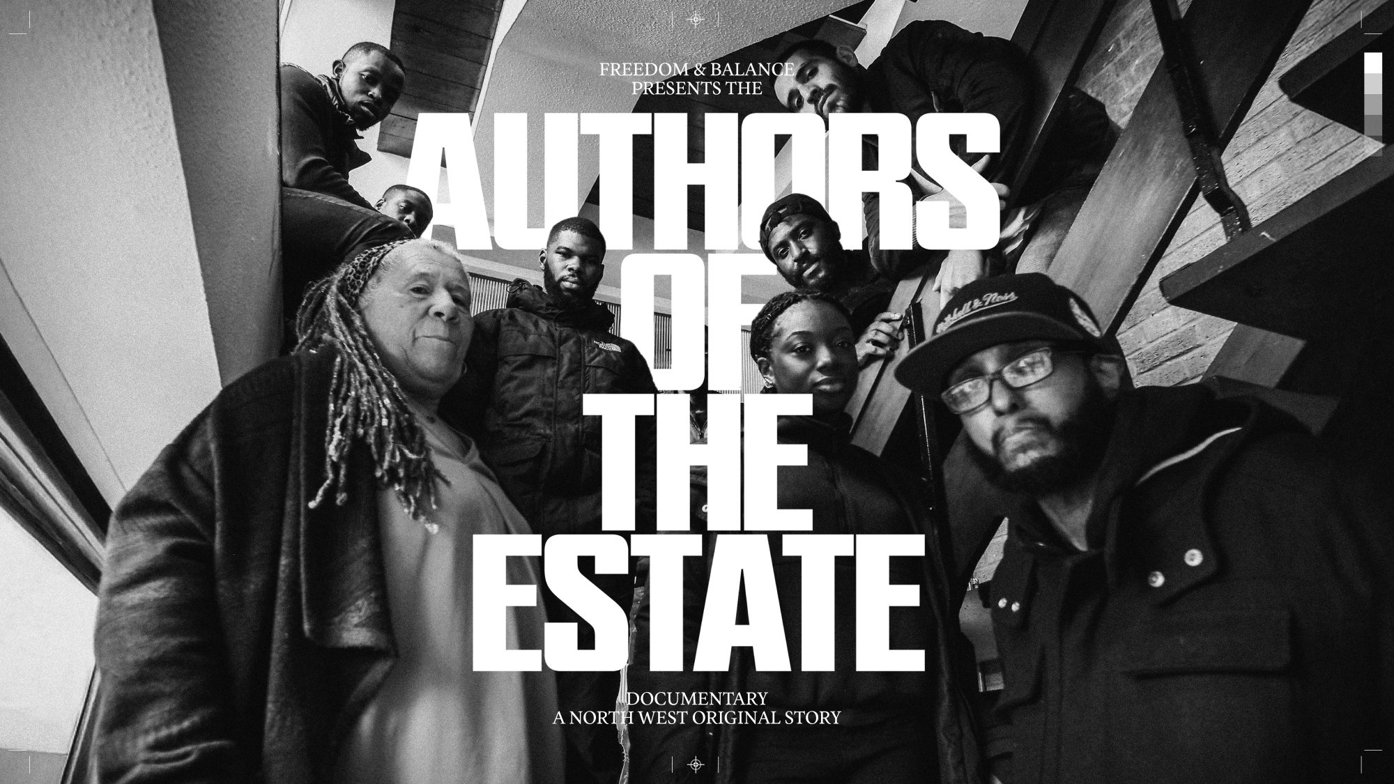 A group of participants in the Authors of The Estate project pose on a staircase around the words Authors of The Estate.