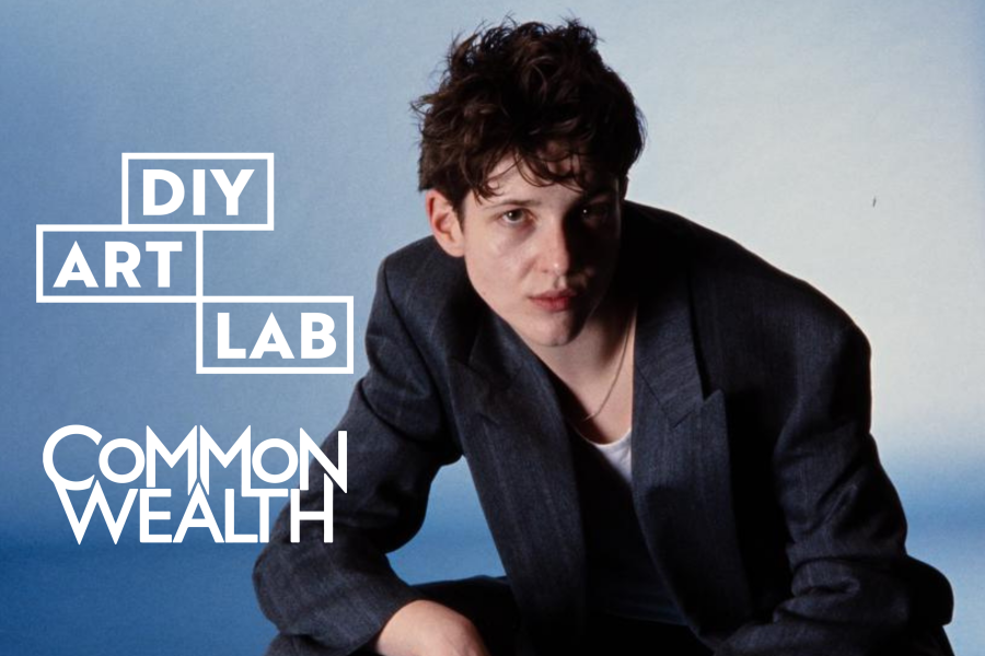 Performer Liv Ello in front of a plain blue background. The text reads Common/Wealth and DIY ART LAB